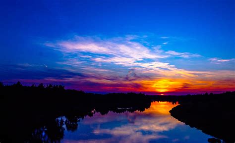 Sunset Skyline River Reflections Hd Wallpaper Pxfuel