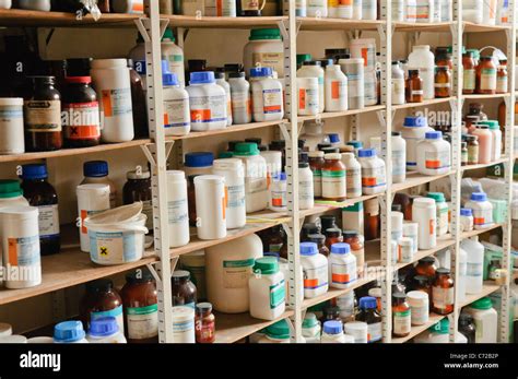 Chemicals On The Shelves Of A School Chemistry Laboratory Stock Photo