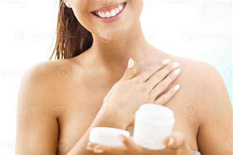 Woman Using Body Lotion On Her Skin Stock Photo At Vecteezy