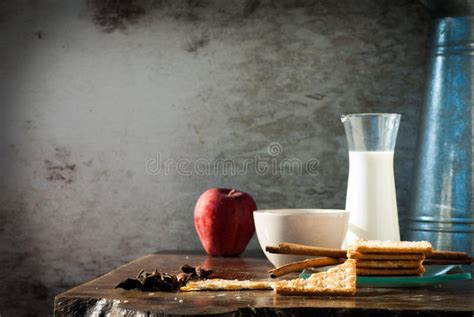 Milk Apple And Biscuits With Black Coffee In The Morning Stock Photo