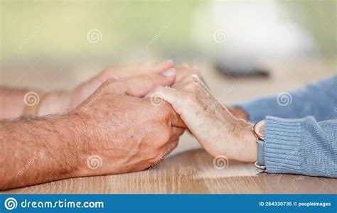 Senior Couple Holding Hands For Love Support And Trust In Retirement
