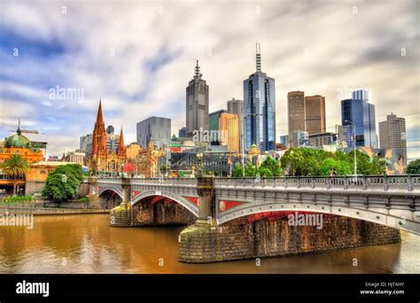 Skyline Of Melbourne Along The Yarra River And Princes Bridge In