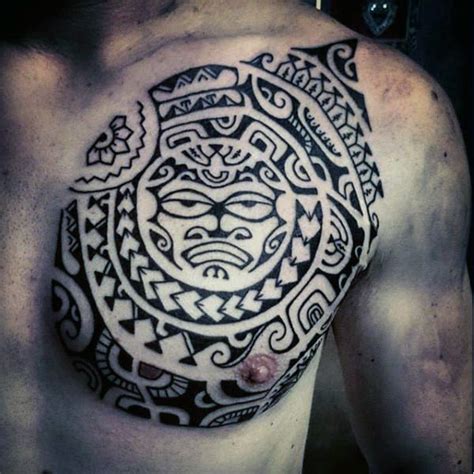 Black color bull tribal tattoo on left chest. 50 Tribal Chest Tattoos For Men - Masculine Design Ideas