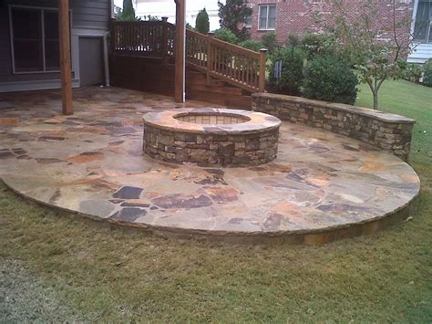 Fire pit and fire ring information about building and designing an outdoor firepit including fire pit construction ideas, fire pit location, design plans, and more. Outdoor stone fire pit. | Outdoor stone, Outdoor fire, Outdoor