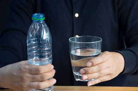 Premium Photo Woman Holding A Glass Of Water The Concept Of Drinking
