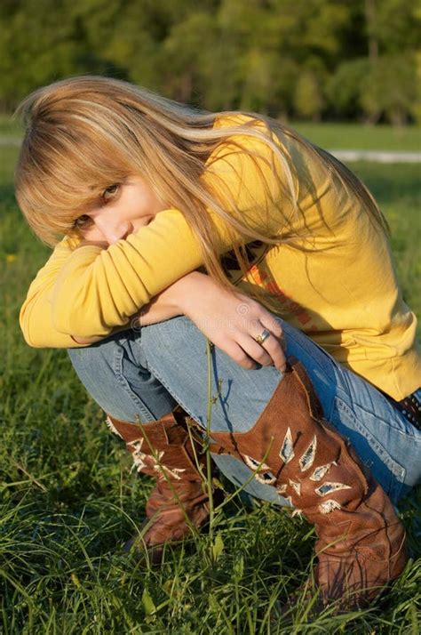 Blond Girl Squatting Picture Image