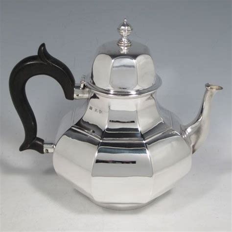 Antique Victorian Sterling Silver Teapot Having An Octagonal Baluster