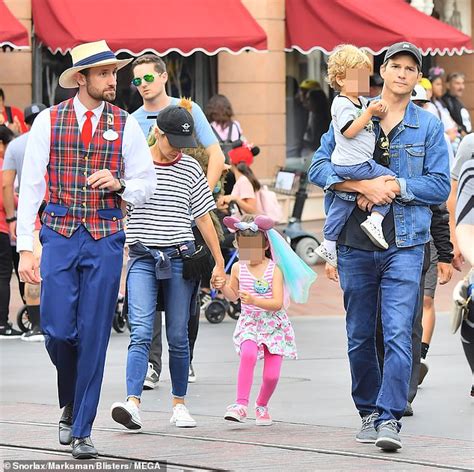 Ashton Kutcher And Mila Kunis With Kids At Disneyland After Demi Moore