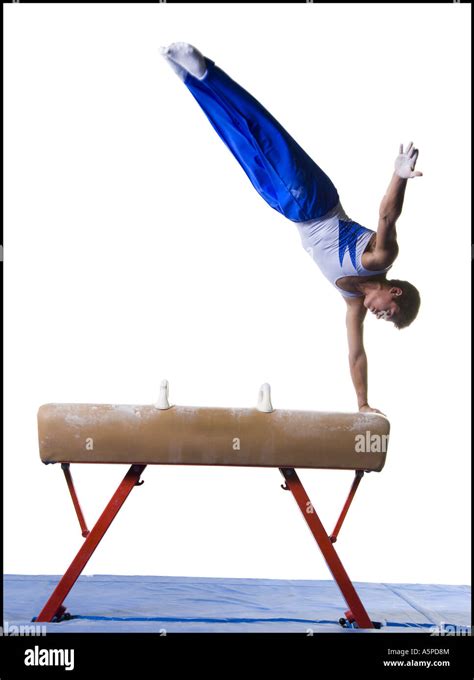 Male Gymnast Performing Routines On Vaulting Horse Stock Photo Alamy