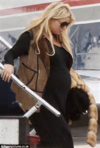 jessica simpson shows off her huge pregnant belly as she steps off her luxury private jet