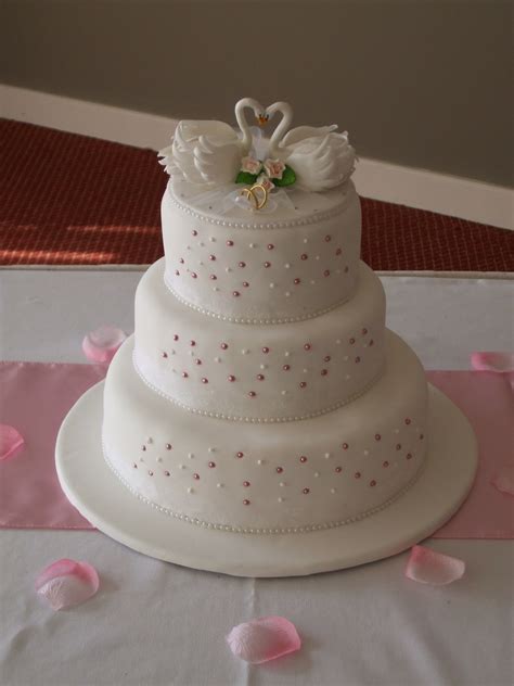 Royal icing is a sweet, fluid paste made from whisked egg whites, icing sugar and lemon juice that sets solid. Swan Lake Wedding Cake (Front) | Swan wedding, Wedding ...