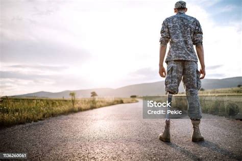 Soldier Returning Home From War With Amputee Leg Stock Photo Download