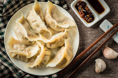 Since the shape of chinese dumplings is similar to ancient chinese gold or silver ingot, they symbolize wealth. Chinese New Year's Eve Family Reunion Dinner - Confucius ...