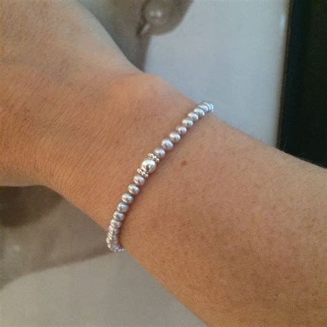 Skinny Grey Freshwater Seed Pearl Stretch Bracelet With Sterling Silver