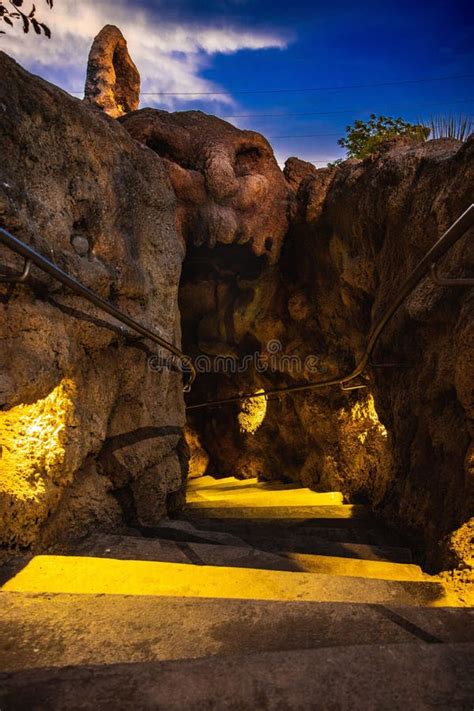 Vertical Shot Of The Artificial Caves Of The Grotto At Night In San