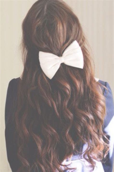 The curly hair bows have many uses. Curly half up half down hair with bow #gorgeoushair | Half ...
