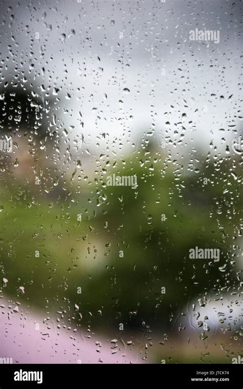 Raindrops On Glass Stock Photo Alamy