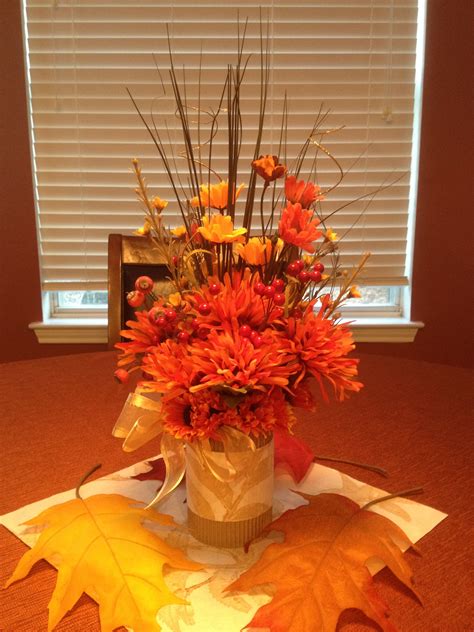 Silk and dried materials in dry flower foam while they are introduced to the use of pan glue, if time permits, class closes with an interactive power point to give students imaginative and unique ideas and create a fall arrangement. Fall arrangement made of a soup can wrapped in scrapbook ...