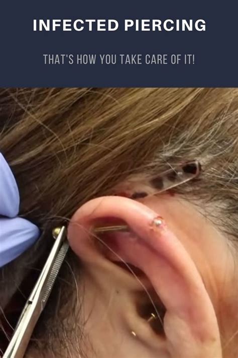 A Woman Getting Her Ear Pierced By Someone With A Pair Of Scissors In Front Of Her