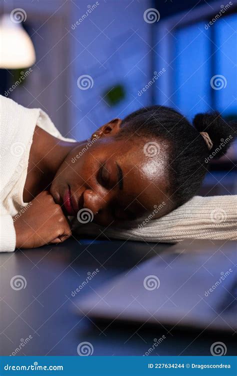 Closeup Of Tired Exhausted African American Businesswoman Sleeping On