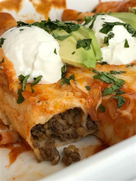 It's made with layers of tortillas, ground beef, cheese, and peppers. Cheesy Beef and Rice Enchiladas - Together as Family