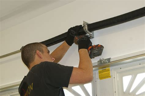 Check spelling or type a new query. Broken Garage Door Springs Repair | Anco Ovehead Door