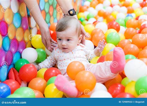 Baby Girl Playing With Colorful Balls Stock Image Image Of Girl
