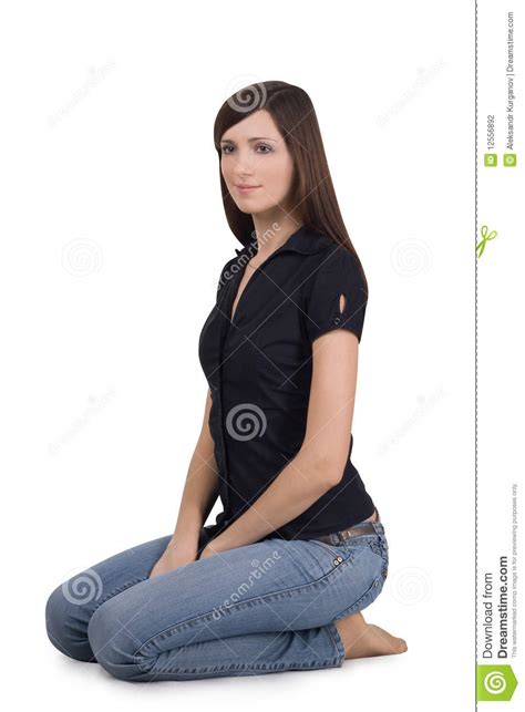 Mulher Que Senta Se Em Seus Joelhos Foto De Stock Imagem De Cabelo Figura 12556892