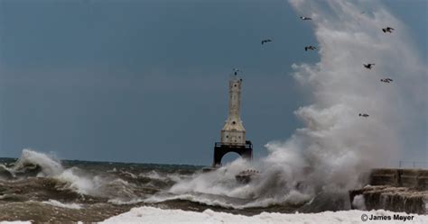 Port Washington Wi Lighthouse Gets Pounded By Waves Ahead