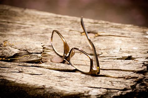 Broken Glasses A Broken Pair Of Glasses Lying On A Wooden … Flickr