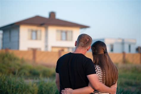 Young Couple Is Looking At House Stock Photo Image Of Happiness
