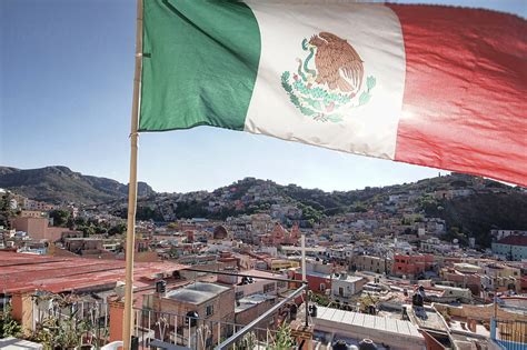 Travel To Mexico Mexican Flag Guanajuato Mexico By Stocksy