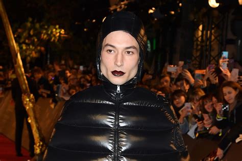 Ezra Miller Wears Puffer Gown And Dark Lipstick To Fantastic Beasts