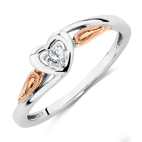 Yellow 18kt gold tends to look more formal and dressy, capable of. Promise Ring with Diamonds in 10ct White & Rose Gold