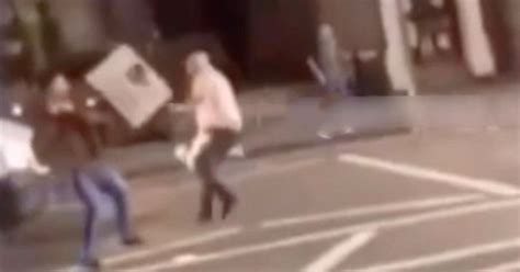 Mass Brawl Between Five Men And One Woman Erupts After Man Hit With A