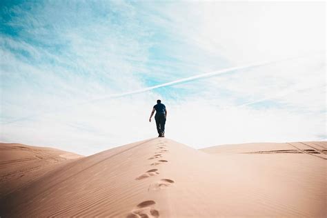 Hd Wallpaper Man Walking On Desert Person Walking On Sand Dune
