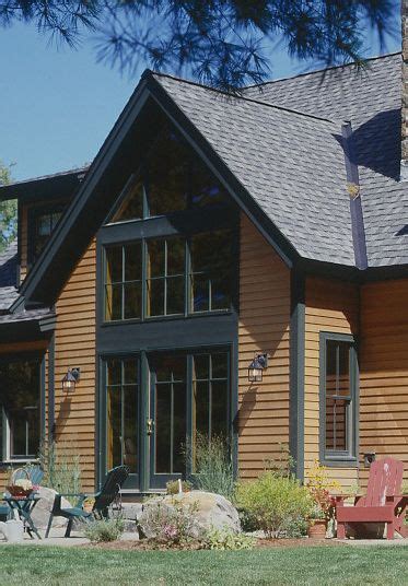 Cedar bevel siding prefinished in your choice of stain, solid color finish, or primed. cedar stain with black accents | House siding options ...