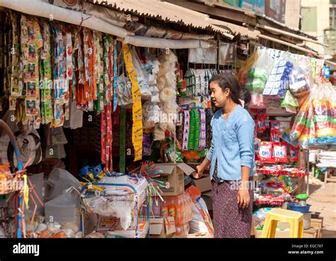 A Young Burmese Woman Shopping At The Local Village Market Mani Sithu