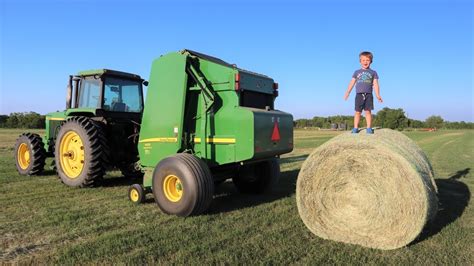 Working On The Farm With Tractors Baling Hay For Kids Round Baler