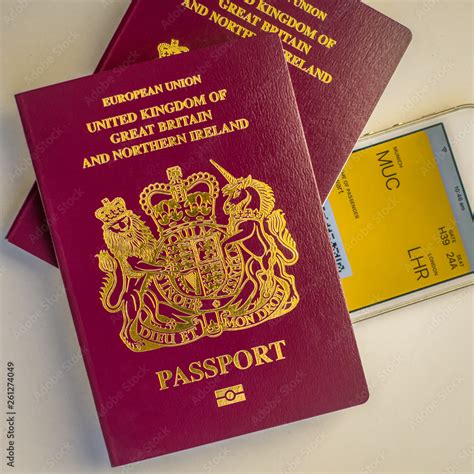 British Passports And Electronic Boarding Pass On Smartphone Stock