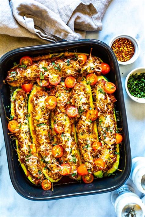 Low carb and keto friendly, they are perfect for meal planning. The BEST EVER Italian Stuffed Zucchini Boats - The Girl on ...