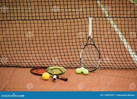 Three Tennis Rackets And Balls On The Indoor Court Stock Image Image Of Professional Health