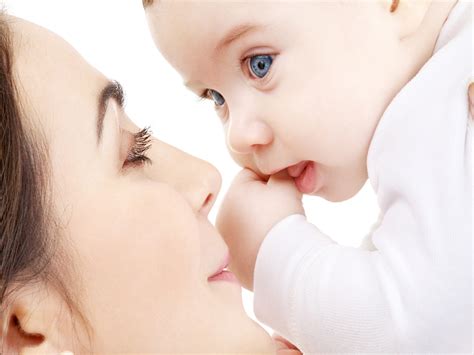 When mother breastfeeds her baby, during one shot, she has a scar on her forehead. Mother And Baby Wallpapers High Quality | Download Free