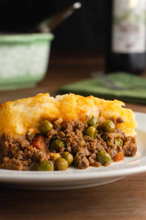 1 tablespoon vegetable oil, 1 large onion, peeled and chopped, 1 large carrot, peeled and chopped, 1 pound ground lamb (or substitute half with another ground meat), 1 cup beef or chicken broth, 1 tablespoon tomato paste, 1 teaspoon chopped fresh or dry rosemary. Traditional Shepherd's Pie - One Happy Housewife