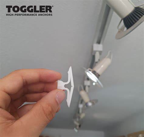 Fixing Light Fittings To A Wall Or Ceiling With Toggler Hollow Wall