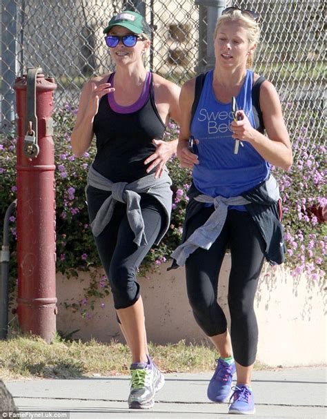 reese witherspoon dons form fitting workout gear as she goes jogging daily mail online