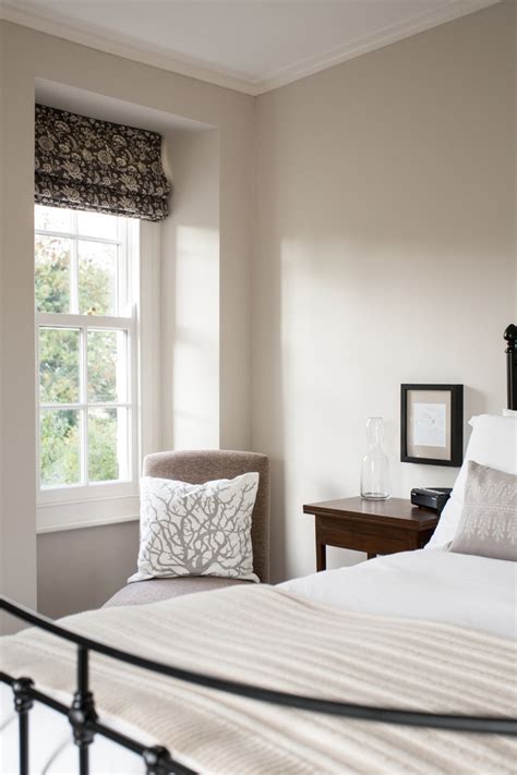 The settee at the end of the bed is vintage and custom upholstered. Impressive slipper chairs in Bedroom Farmhouse with Small ...