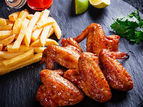 Chicken Wings And Chips Sizzling Lounge