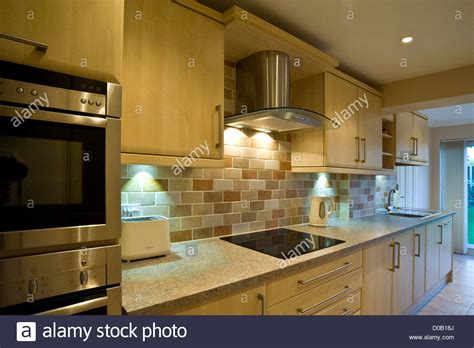 112m consumers helped this year. New kitchen interior showing cooker, microwave, ceramic ...