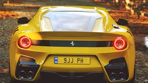 Download Wallpaper 1366x768 Ferrari Sports Car Yellow Rear View